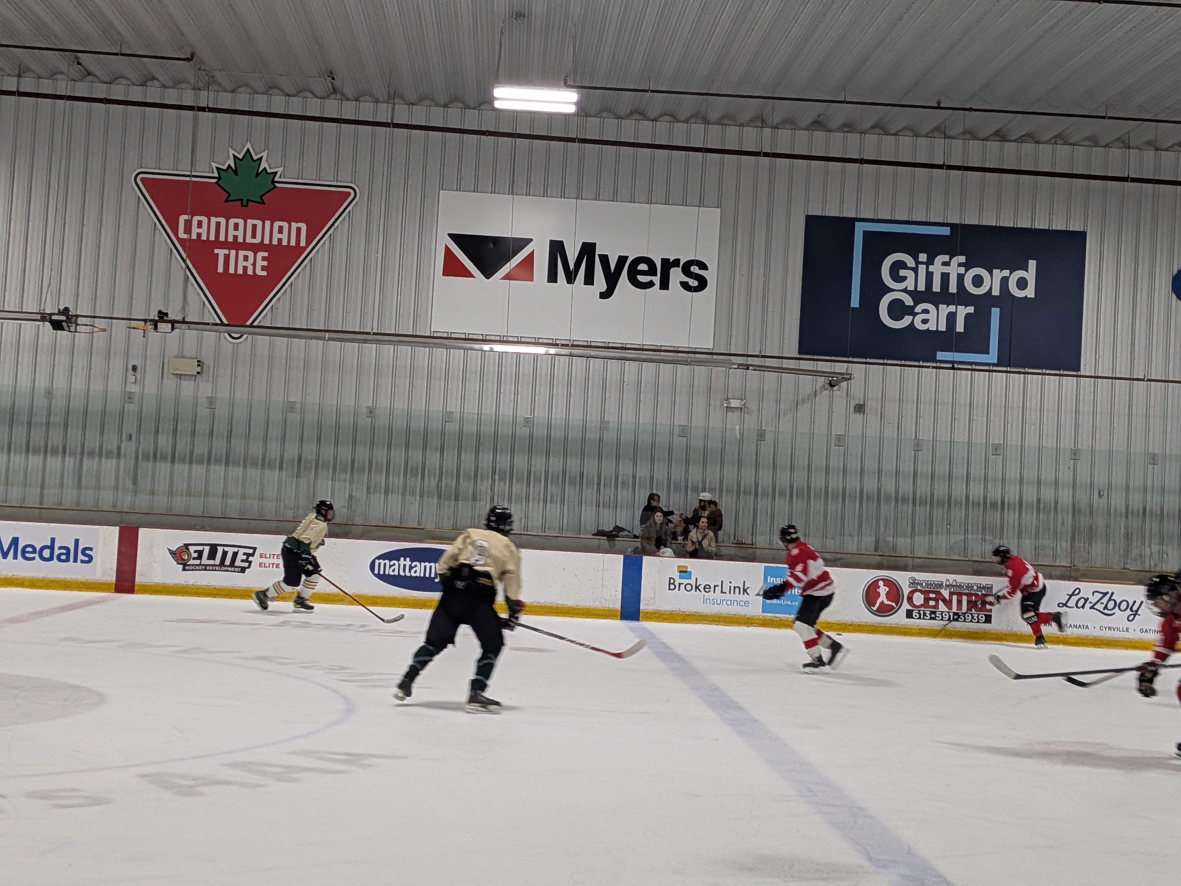 OARHL game action at the boards, Sep 21